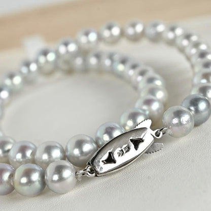 Tossaki Akoya pearl necklace featuring 7-7.5mm round pearls with silver clasp on a 42cm strand