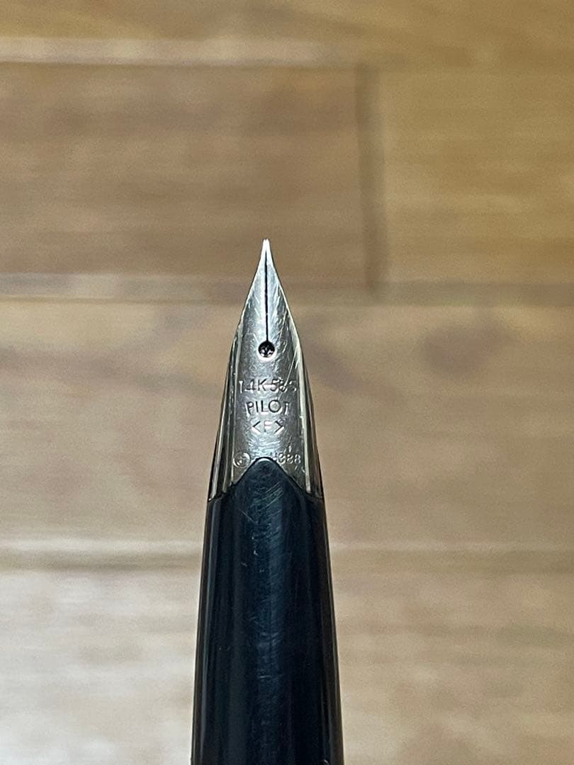 PILOT Elite Fountain Pen in black with 14K gold nib, model 14K-585, shown uncapped on white background
