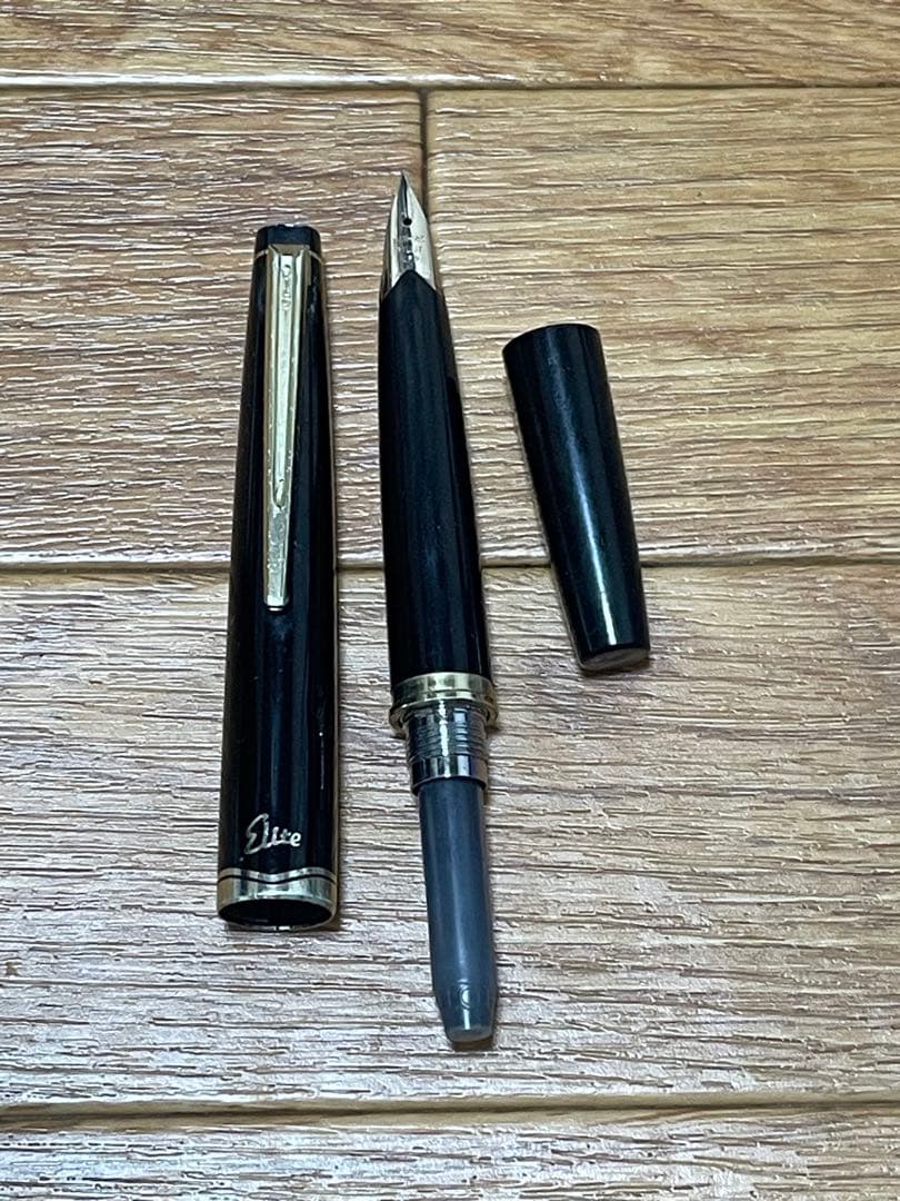 PILOT Elite Fountain Pen in black with 14K gold nib, model 14K-585, shown uncapped on white background