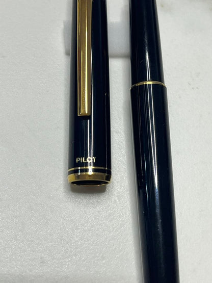Pilot Japanese-made fountain pen with black and gold barrel and fine gold-plated nib