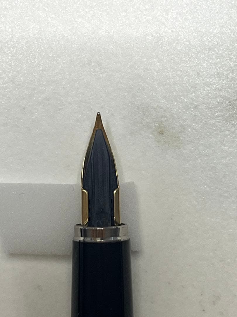 Pilot Japanese-made fountain pen with black and gold barrel and fine gold-plated nib