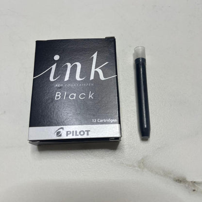 Pilot Japanese-made fountain pen with black and gold barrel and fine gold-plated nib
