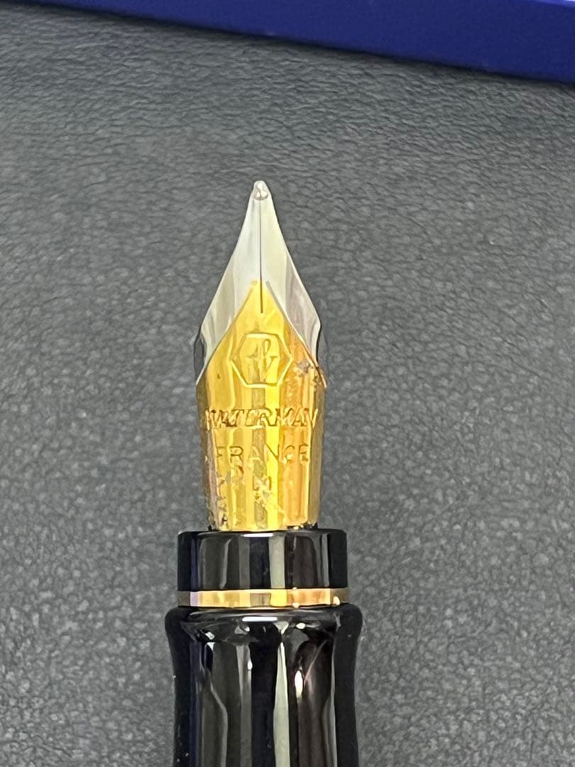 Waterman fountain pen in clean condition with converter included shown on a white background