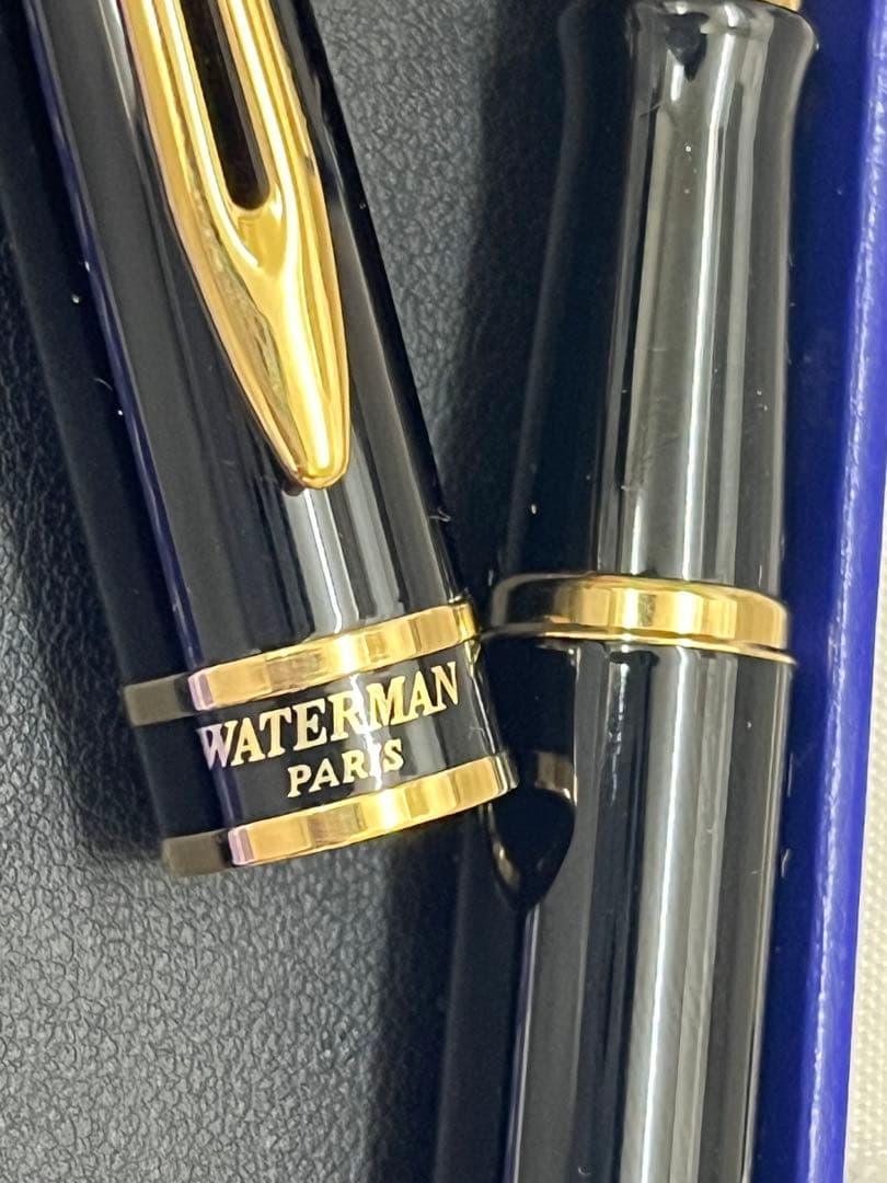 Waterman fountain pen in clean condition with converter included shown on a white background