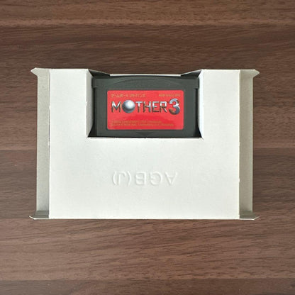 Mother 3 game cartridge for Game Boy Advance with RPG packaging