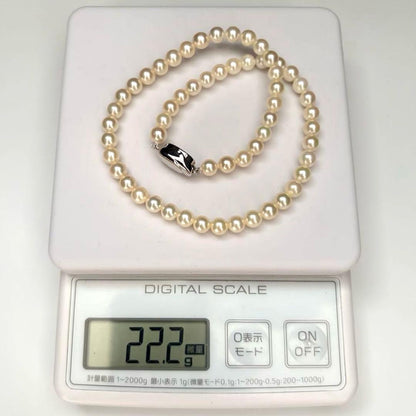 Akoya pearl necklace featuring 6.5mm round white pearls with a 37cm length and classic elegant design