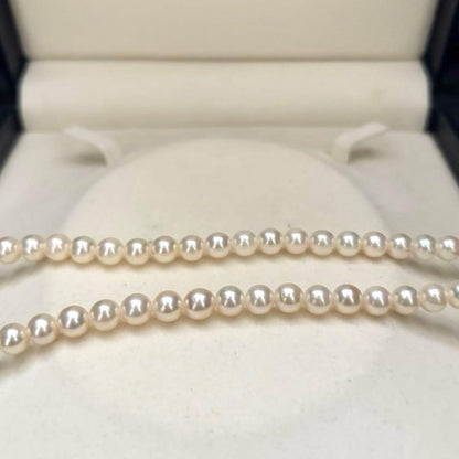 Akoya pearl necklace featuring 6.5mm round white pearls with a 37cm length and classic elegant design