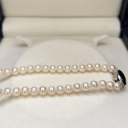 Akoya pearl necklace featuring 6.5mm round white pearls with a 37cm length and classic elegant design