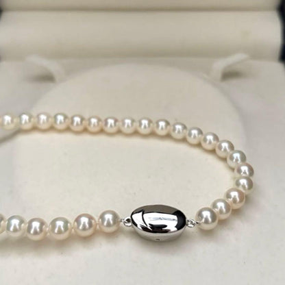 Akoya pearl necklace featuring 6.5mm round white pearls with a 37cm length and classic elegant design