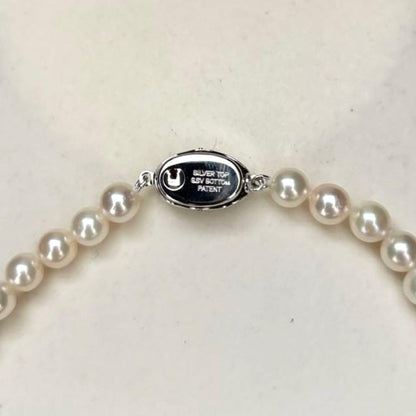 Akoya pearl necklace featuring 6.5mm round white pearls with a 37cm length and classic elegant design
