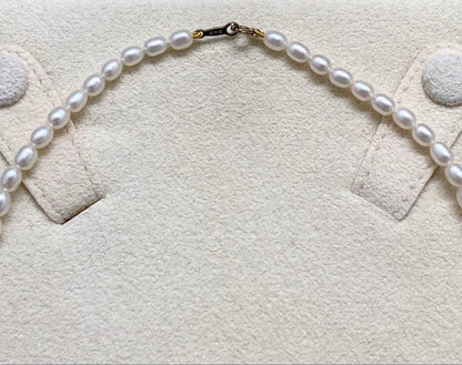 Mikimoto baby pearl necklace with removable M charm in K18 yellow gold clasp, pearls about 5mm, length 41cm