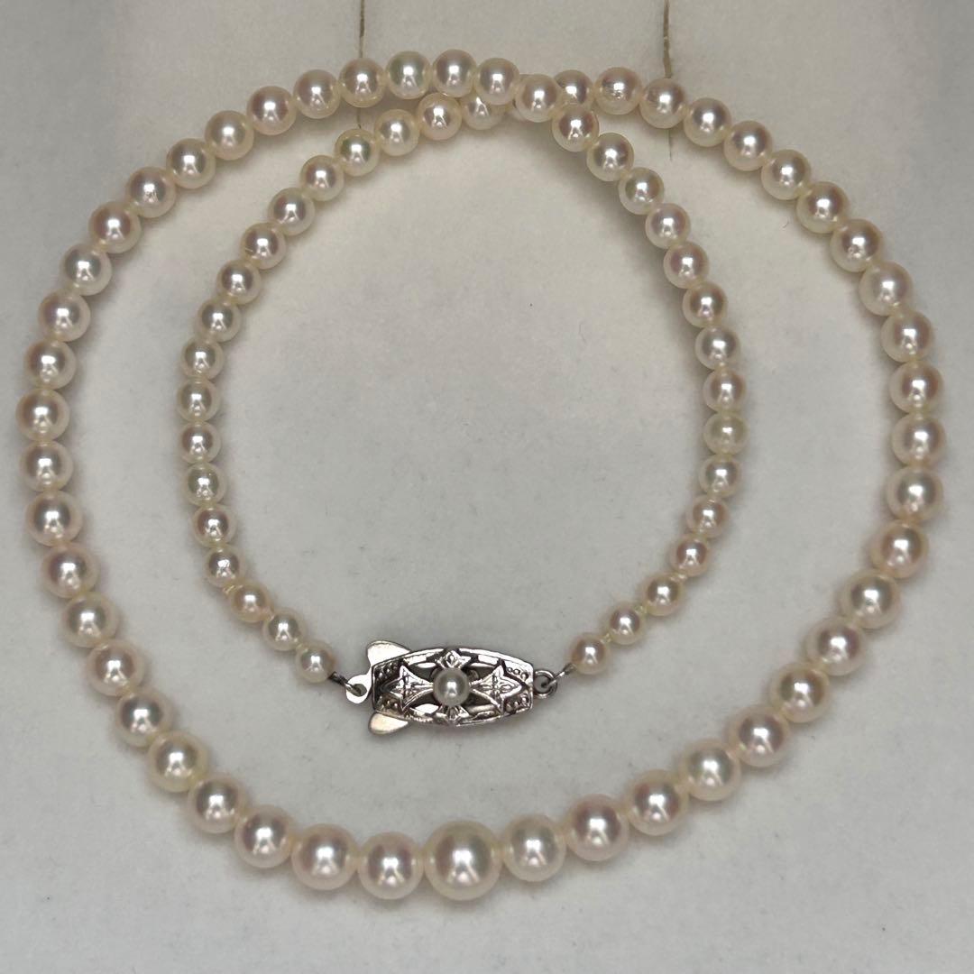Mikimoto Akoya pearl graduated necklace with 7mm pearls, 40cm length, sterling silver clasp