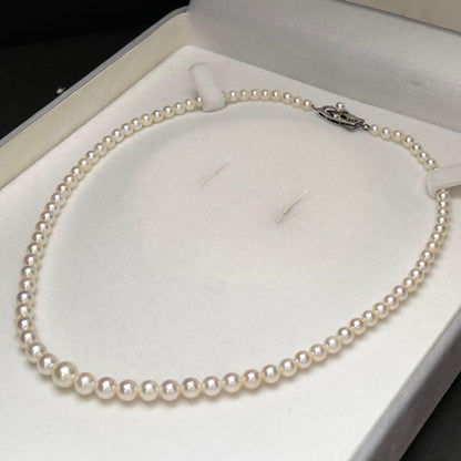 Mikimoto Akoya pearl graduated necklace with 7mm pearls, 40cm length, sterling silver clasp