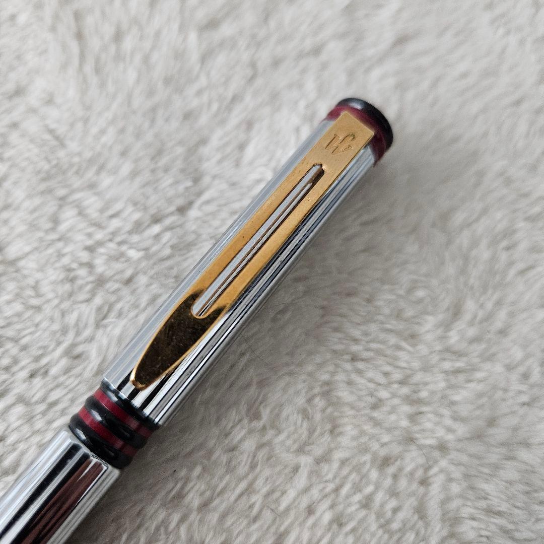 Waterman Forum Agora ballpoint pen in silver with red and gold accents