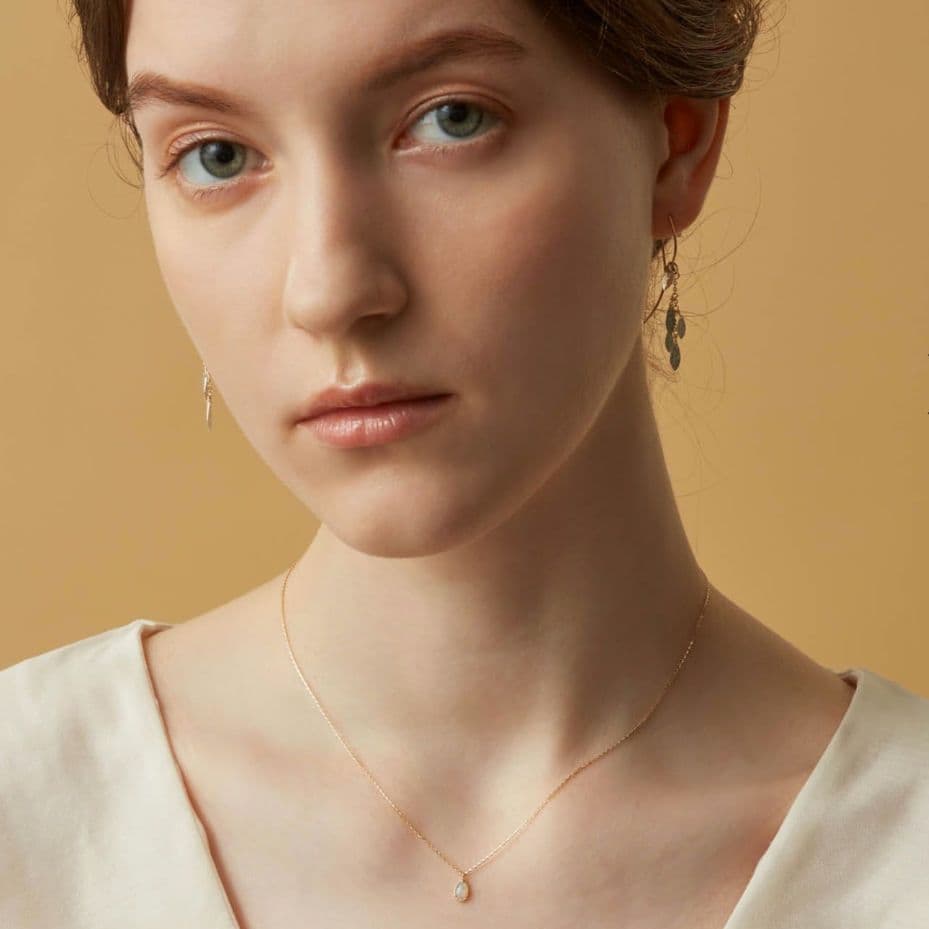 Opal droplet necklace with K10 gold and agate pendant on a delicate gold chain