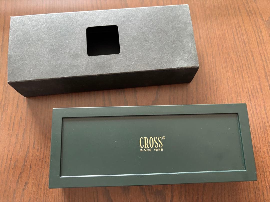 CROSS ballpoint pen and mechanical pencil set in navy and gold with a dedicated case showing slight cushion damage