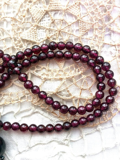 Agete garnet necklace with silver 925 chain and round pendant featuring a 1 cm garnet stone