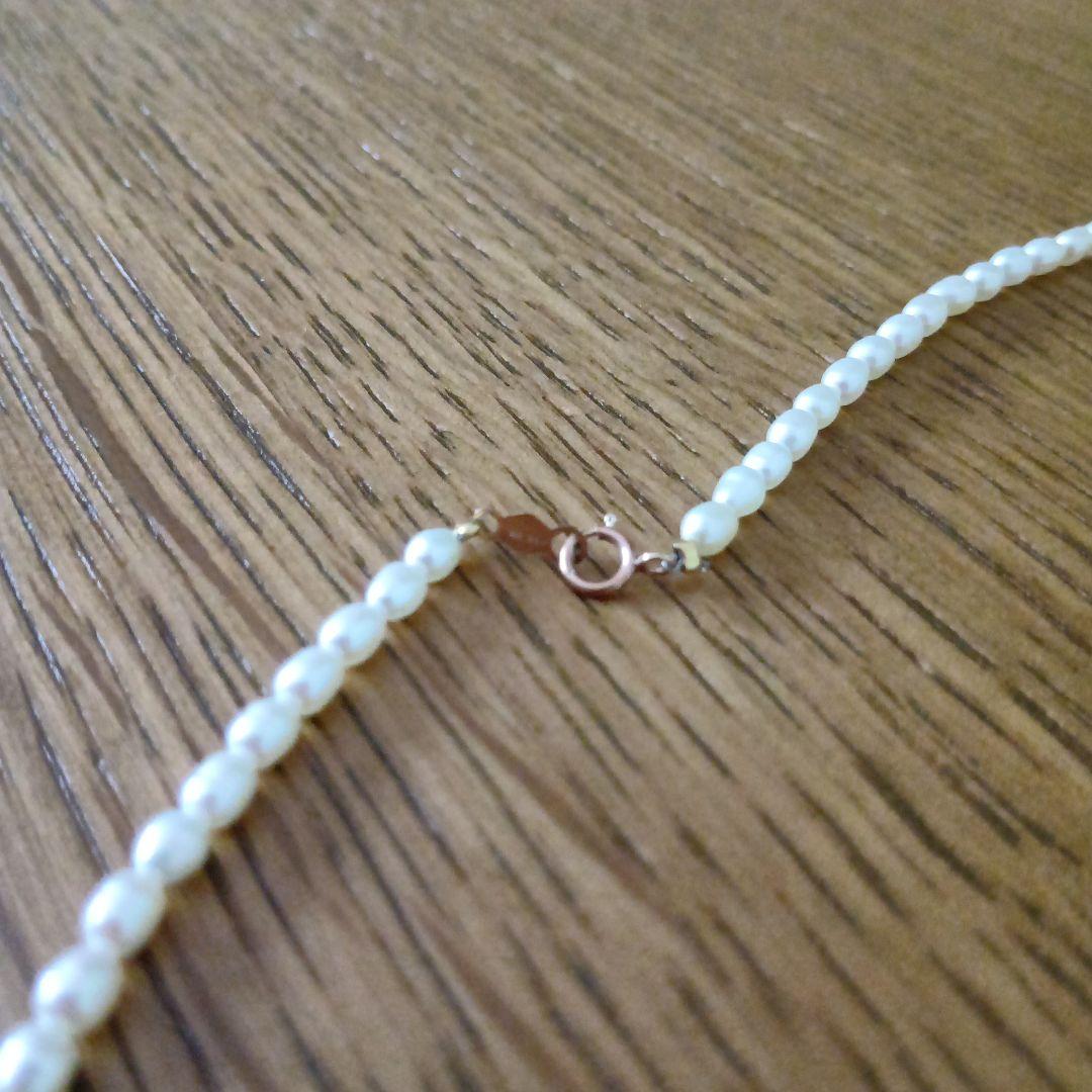 Mikimoto pearl necklace with 41.5 cm length featuring a K14 metal flower-shaped top pendant