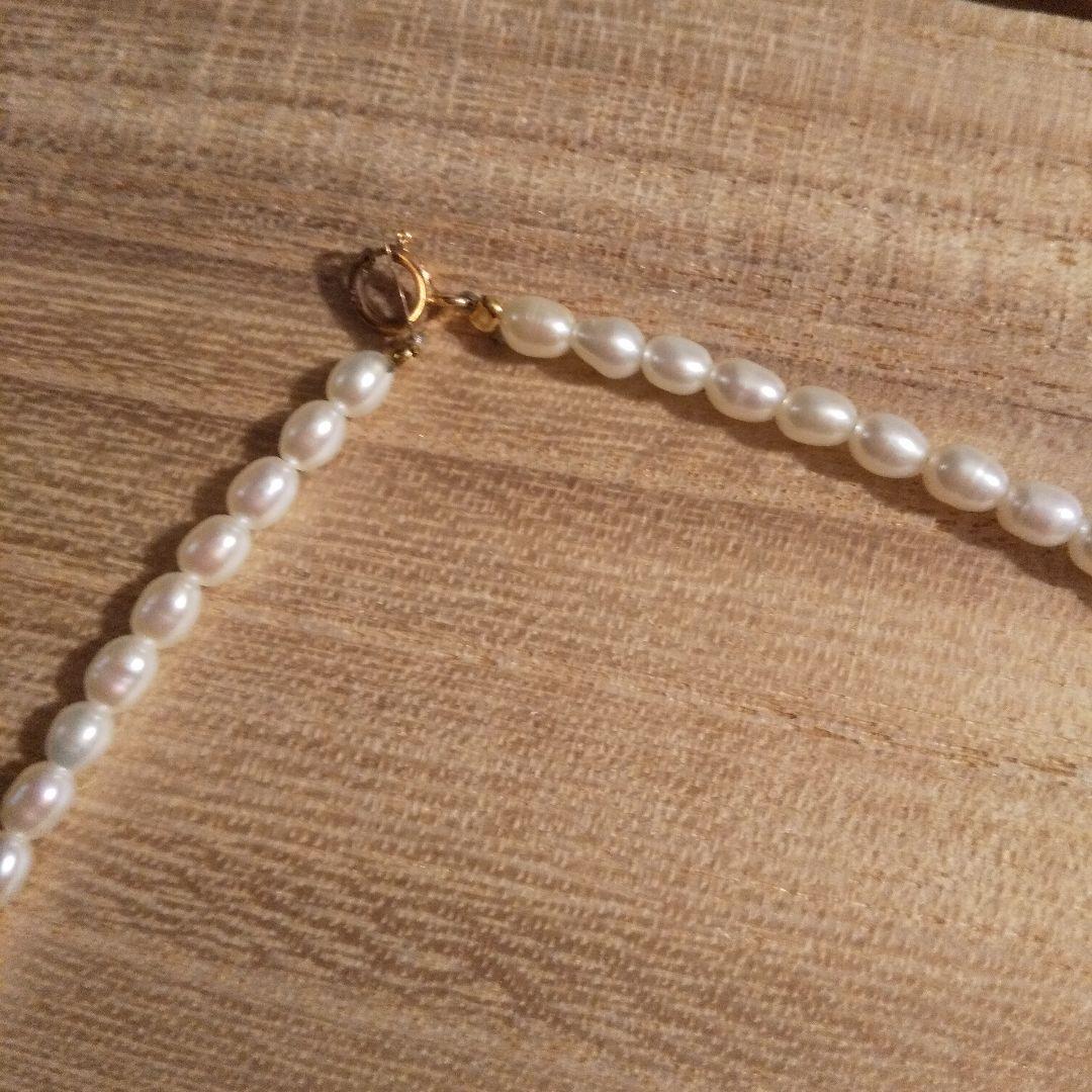 Mikimoto pearl necklace with 41.5 cm length featuring a K14 metal flower-shaped top pendant
