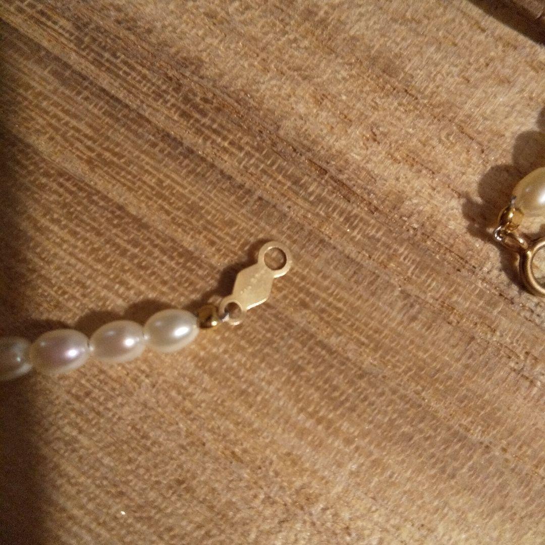 Mikimoto pearl necklace with 41.5 cm length featuring a K14 metal flower-shaped top pendant