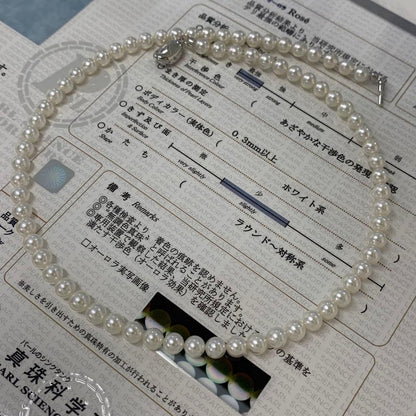 Kuro Aurora Rosé Akoya baby pearl necklace 5.5-6mm with silver clasp on a white background