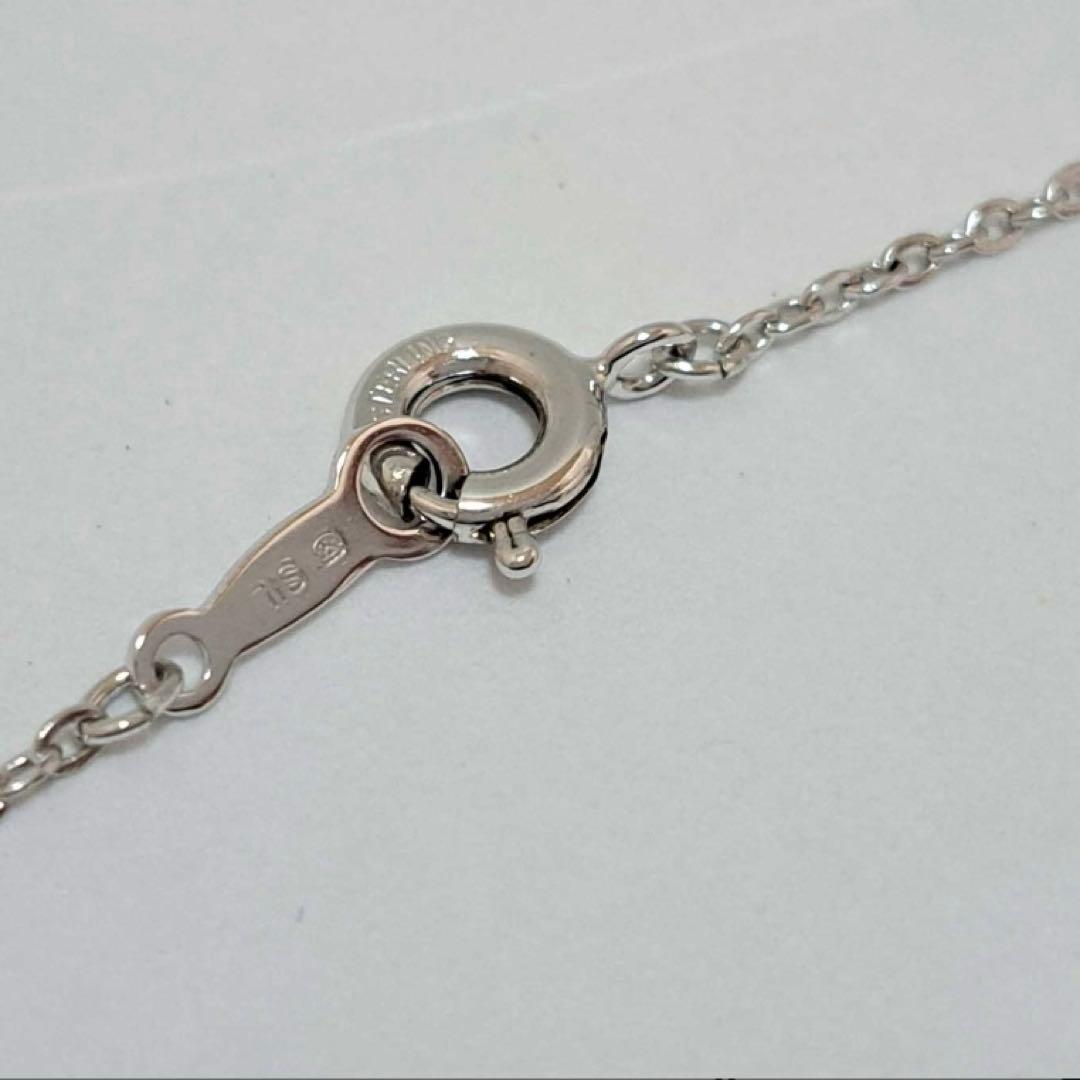 Mikimoto Akoya Pearl silver necklace featuring a 6mm pearl on a delicate chain with engraved silver motif