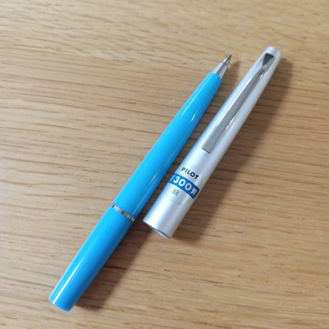Discontinued Pilot short ballpoint pen in blue and silver with minor storage scratches