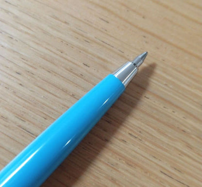 Discontinued Pilot short ballpoint pen in blue and silver with minor storage scratches