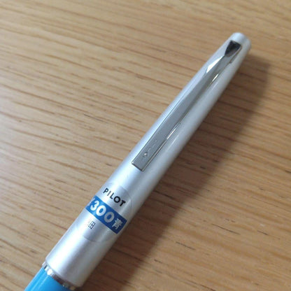 Discontinued Pilot short ballpoint pen in blue and silver with minor storage scratches