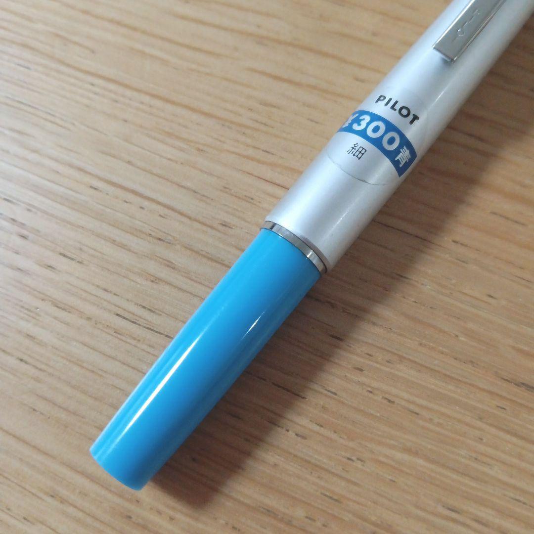Discontinued Pilot short ballpoint pen in blue and silver with minor storage scratches