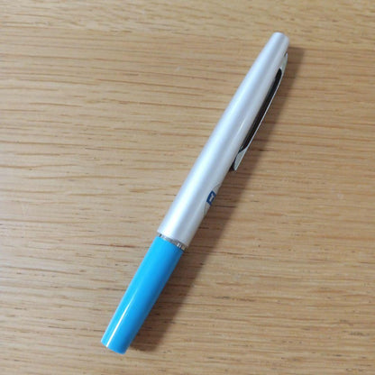Discontinued Pilot short ballpoint pen in blue and silver with minor storage scratches