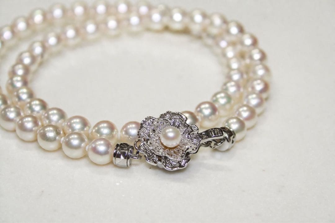 Akoya pearl necklace with silver imprint featuring 6.0-6.28mm pearls, approximately 42 cm long