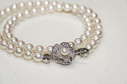 Akoya pearl necklace with silver imprint featuring 6.0-6.28mm pearls, approximately 42 cm long