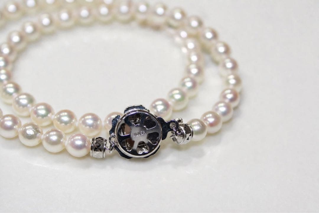 Akoya pearl necklace with silver imprint featuring 6.0-6.28mm pearls, approximately 42 cm long