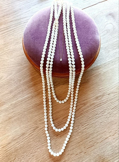 Agete freshwater pearl long necklace measuring 2 meters with lustrous white pearls
