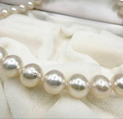 Yamato Akoya Pearl Necklace with 8mm white pearls, 39cm length, displayed on a black jewelry stand