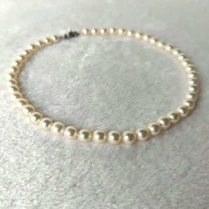 Tasaki silver necklace featuring Akoya pearls sized approximately 7.4cm to 7.8cm on a 41cm chain