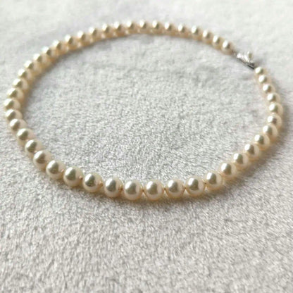 Tasaki silver necklace featuring Akoya pearls sized approximately 7.4cm to 7.8cm on a 41cm chain