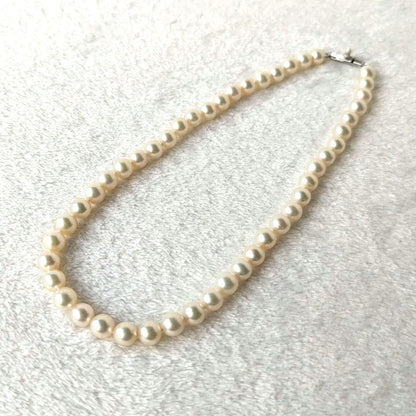 Tasaki silver necklace featuring Akoya pearls sized approximately 7.4cm to 7.8cm on a 41cm chain