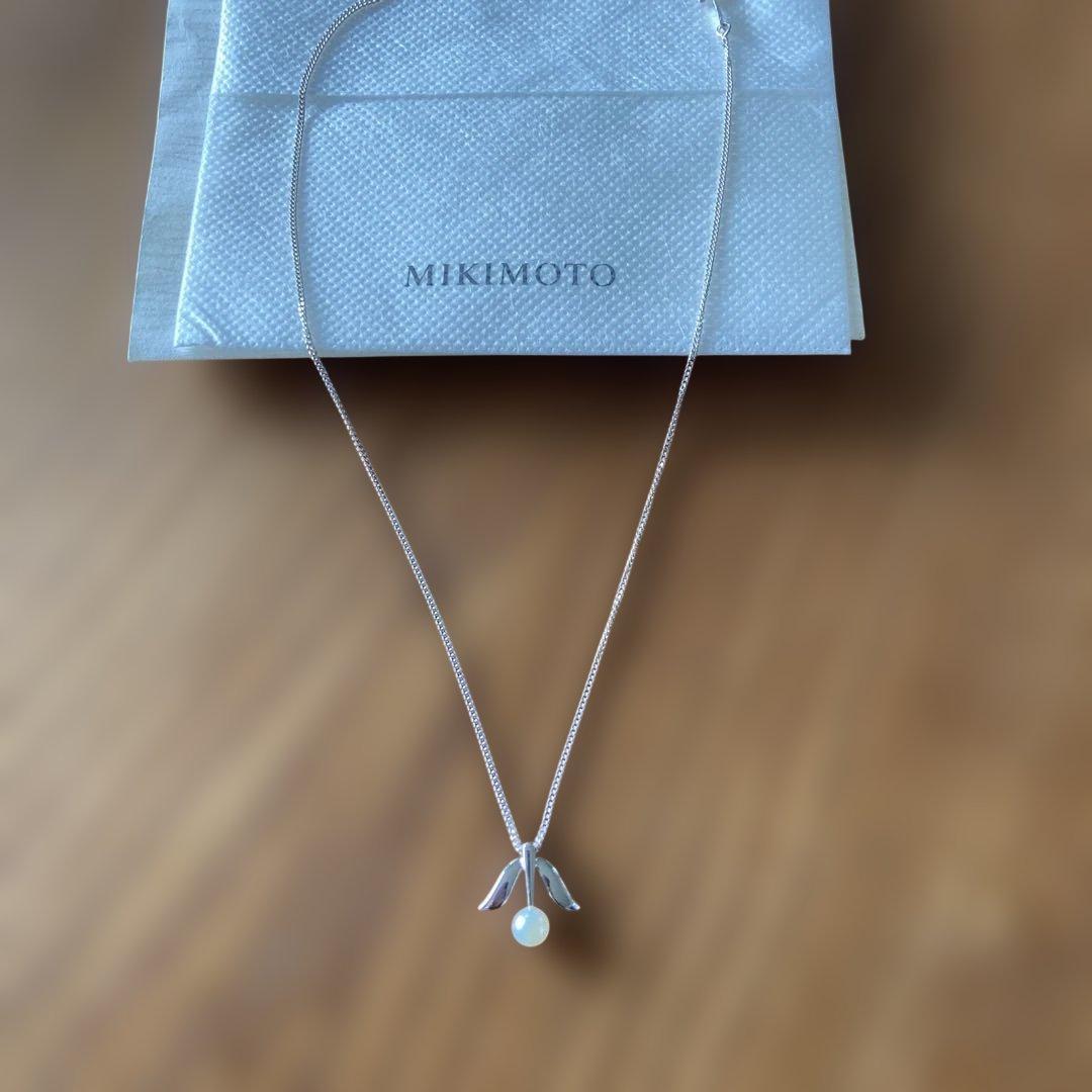 MIKIMOTO Silver Pearl Necklace featuring lustrous pearls on a delicate silver chain