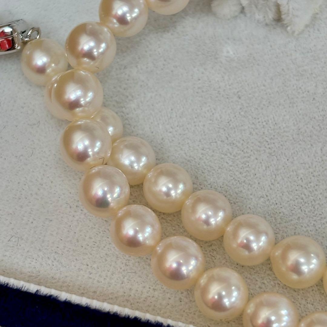 TASAKI pearl necklace and earring set with a 40 cm necklace and 2.1 g earrings displayed on white background