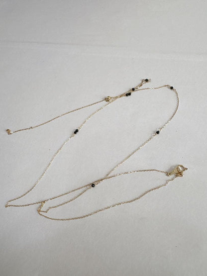 agete K10 Y-shaped necklace with a 70 cm long gold chain displayed on white background