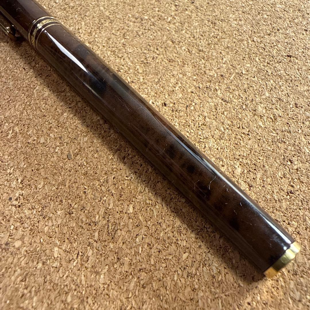 Vintage Pilot fountain pen with marble barrel and fine nib shown uncapped
