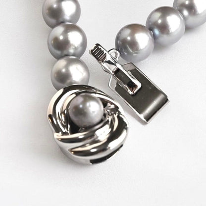 Takashi Akoya pearl necklace and matching earrings with silver clasp featuring 7.5-7 mm pearls