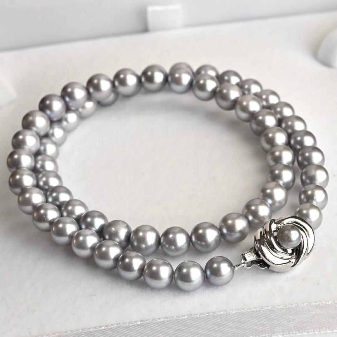 Takashi Akoya pearl necklace and matching earrings with silver clasp featuring 7.5-7 mm pearls