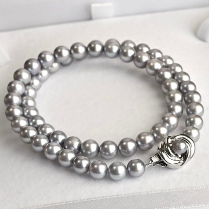 Takashi Akoya pearl necklace and matching earrings with silver clasp featuring 7.5-7 mm pearls