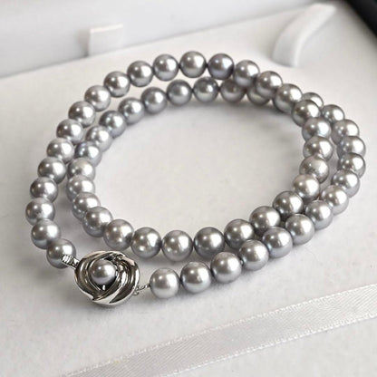 Takashi Akoya pearl necklace and matching earrings with silver clasp featuring 7.5-7 mm pearls