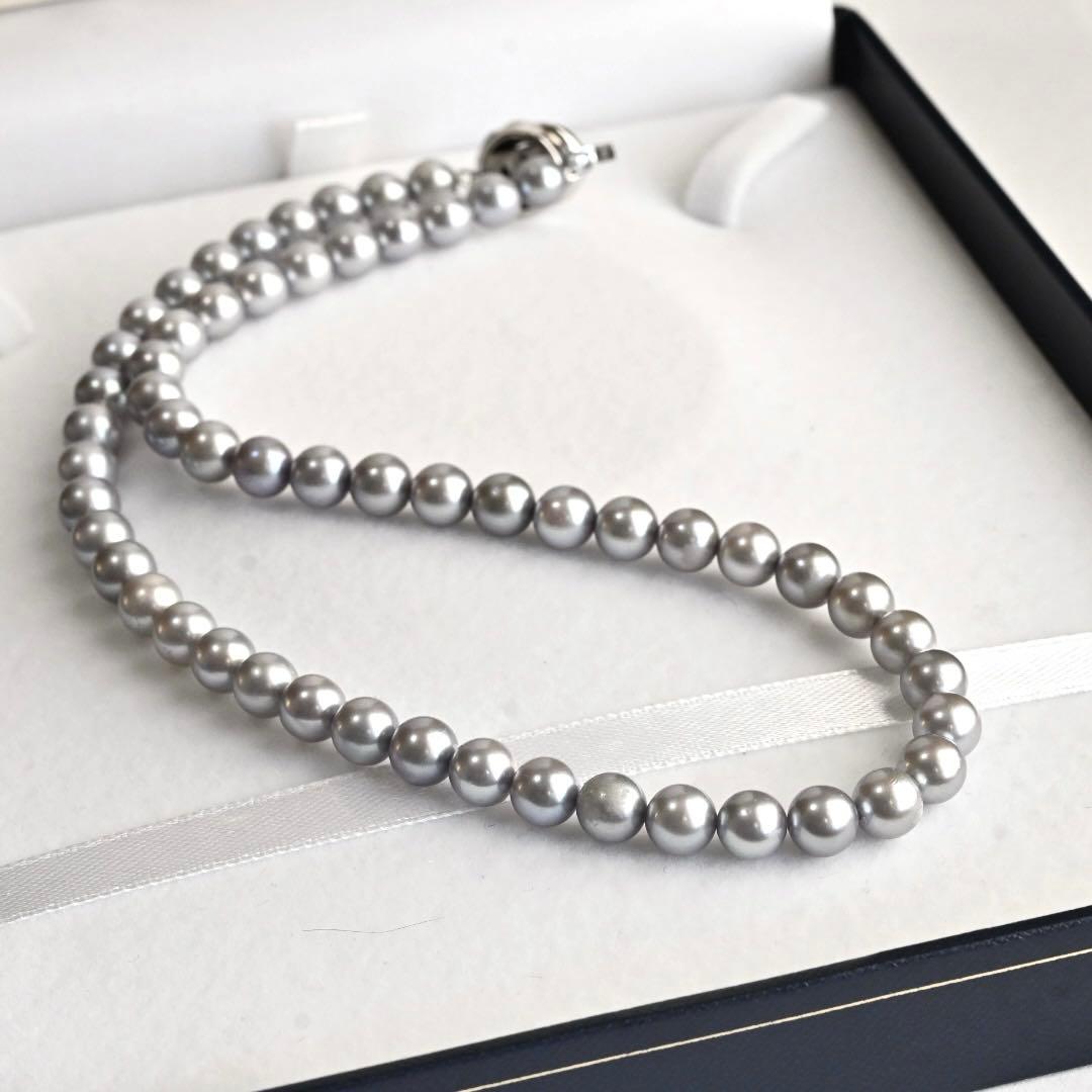 Takashi Akoya pearl necklace and matching earrings with silver clasp featuring 7.5-7 mm pearls