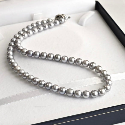 Takashi Akoya pearl necklace and matching earrings with silver clasp featuring 7.5-7 mm pearls