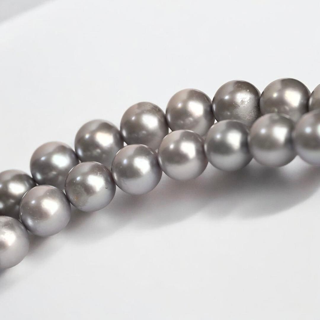 Takashi Akoya pearl necklace and matching earrings with silver clasp featuring 7.5-7 mm pearls